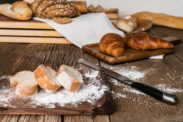 Background of variety mixed homemade organic bio fresh bake pastry ( sliced bread, toast, loaf, Croissant and baguette ). Best for delicious healthy vegetarian meal breakfast lunch with chess and  jam
