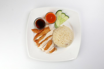 South east asian style chicken rice set steamed roasted sliced chicken with soup dark chilli sauce malaysia china