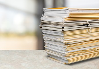 File folders with documents on the office desk