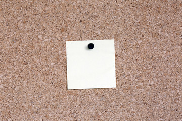 blank note paper on cork board