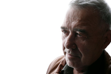 Portrait of old man on white background. Aged male in profile. Free space for text.