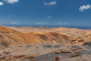 mountain landscape with blue sky and clouds