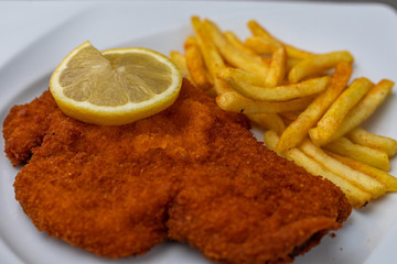 Breaded viennese schnitzel with french fries