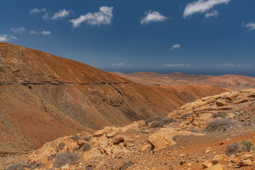 Fototapeta na wymiar desert landscape with blue sky and clouds