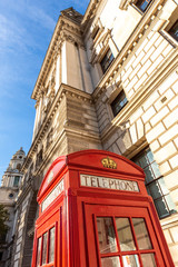 Fototapeta na wymiar Red phone booth in London. United Kingdom.