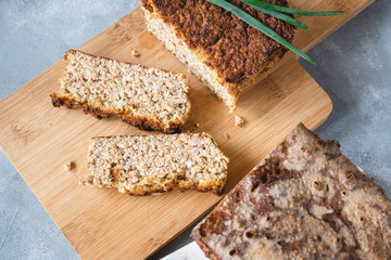 Homemade chicken and liver pate served on cutting board