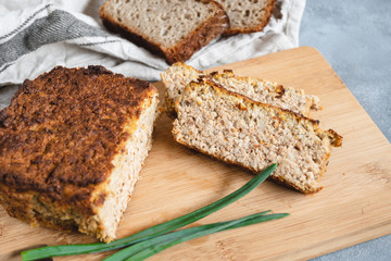 Homemade chicken and liver pate served on cutting board