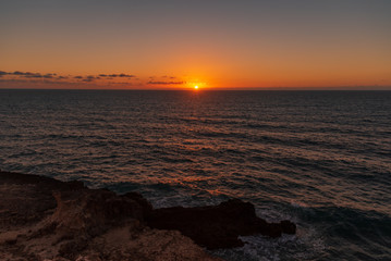 caves and cliffs of Fuerteventura in Spain at sunset
