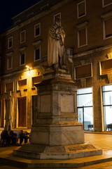 Piacenza, Italy: night view of the statue of Romagnosi	