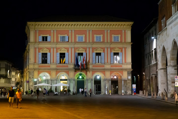 View of the "Palazzo del comune" (Palace of municipality) in Piacenza at night , Italy