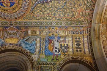 Fototapeta na wymiar Mosaic on the ceiling of Kaiser Wilhelm Memorial Church. Partially restored interior. Berlin. Germany