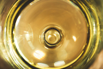 a glass of white wine close-up, selective focus