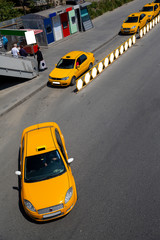 yellow taxi cars on the street