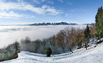 Panorama with fog in the valley below.