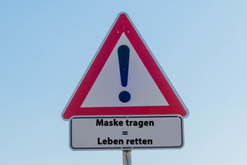 Schild Maske tragen Leben retten 