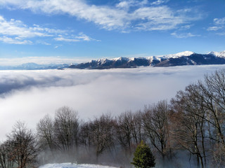 Panorama with fog in the valley below.