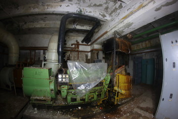 generator in an abandoned bomb shelter