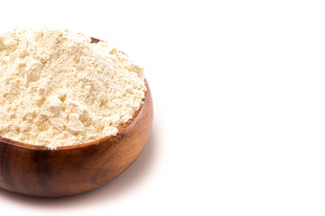 Bowl of Millet Flour in a Wood Bowl Isolated on a White Background