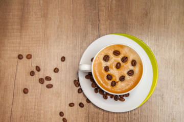 Cup of aromatic natural coffee with thick foam