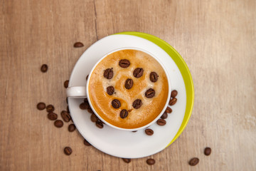 Cup of aromatic natural coffee with thick foam