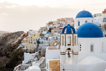 Naklejka premium Oia Village On Santorini Island at sunrise, Greece