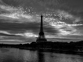 Fototapeta na wymiar Black and White Photography of Early morning on river Seine with the view on Eiffel Tower in Paris, France