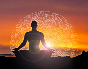 silhouette of a woman or man meditating