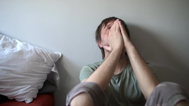Depressed man at home