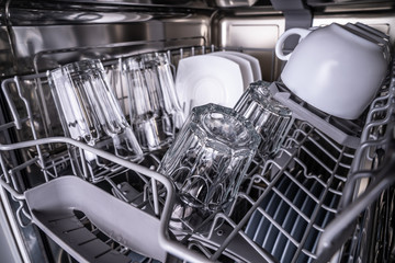 Set of clean dish in dishwasher