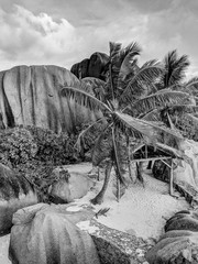 Black and White Photography of an Amazing tropical beach Anse Source d'Argent with granite boulders at sunset, La Digue Island, Seychelles