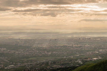 The capital of Bulgaria poured with rays of light in the early mourning. Almost aerial view of the city from the surroundings of Vitosha mountain.