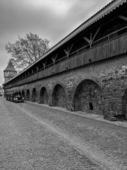 Fototapeta premium Black and White Photography of a Fortress Wall - Zidul Cetatii street from old town Sibiu, Romania