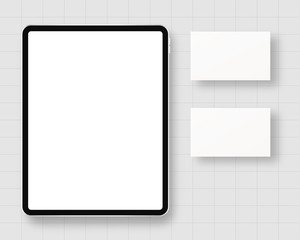Blank business cards and tablet isolated on grey background. Stationery mockup vector. Branding stationery mockup scene. Realistic vector illustration.