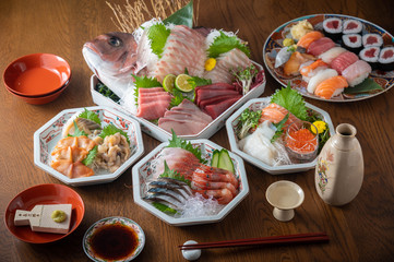 traditional japanese sashimi paltes with sushi