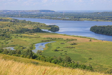 Fototapeta na wymiar view of the valley of the river Vyatka and flood meadows from the high bank