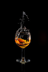 drink fruit cup splash black background