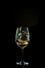drink fruit cup splash black background