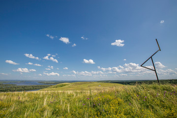 beautiful hills on the high bank of the river Vyatka on a sunny day in summer