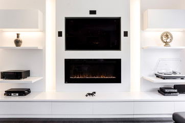 Black television with artificial fireplace