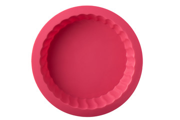 Red silicone baking dish isolated on a white background.