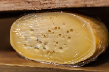 Traditional Dutch cheese displayed for sale in shop market