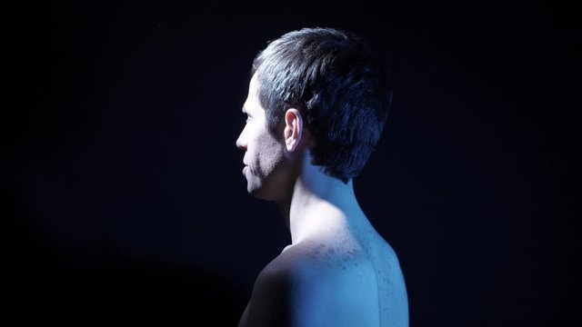 Rotating man on black background