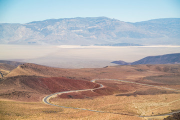 desert road leading to death valley national park