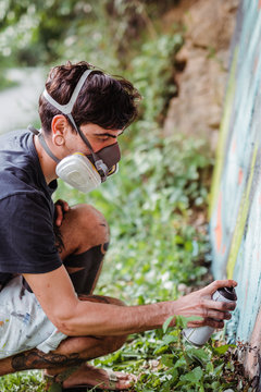 Graffiti artist painting