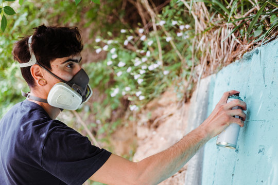 Graffiti artist painting