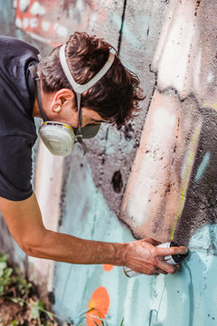 Graffiti artist painting