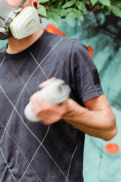 Graffiti artist painting