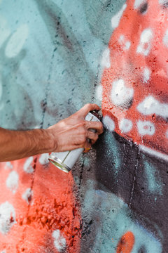 Graffiti artist painting