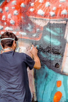 Graffiti artist painting