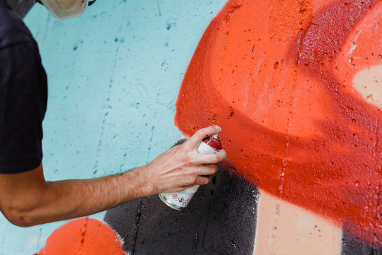 Graffiti artist painting